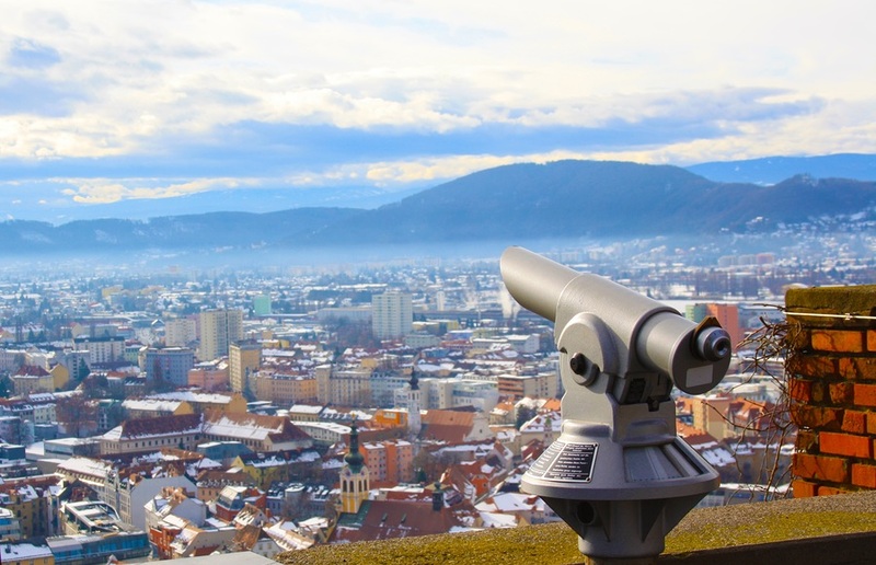 Telescope on wall above city, austria, Graz / pixy.org